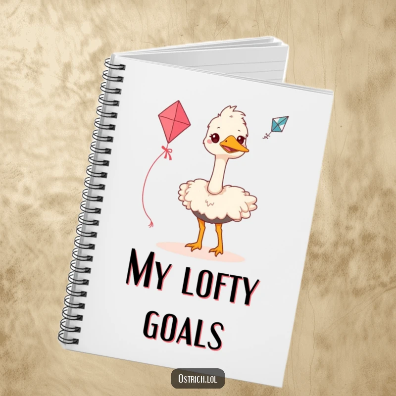 Funny ostrich notebook featuring a grinning bird attempting to fly a kite, perfect for documenting goals with a humorous and inspiring touch.