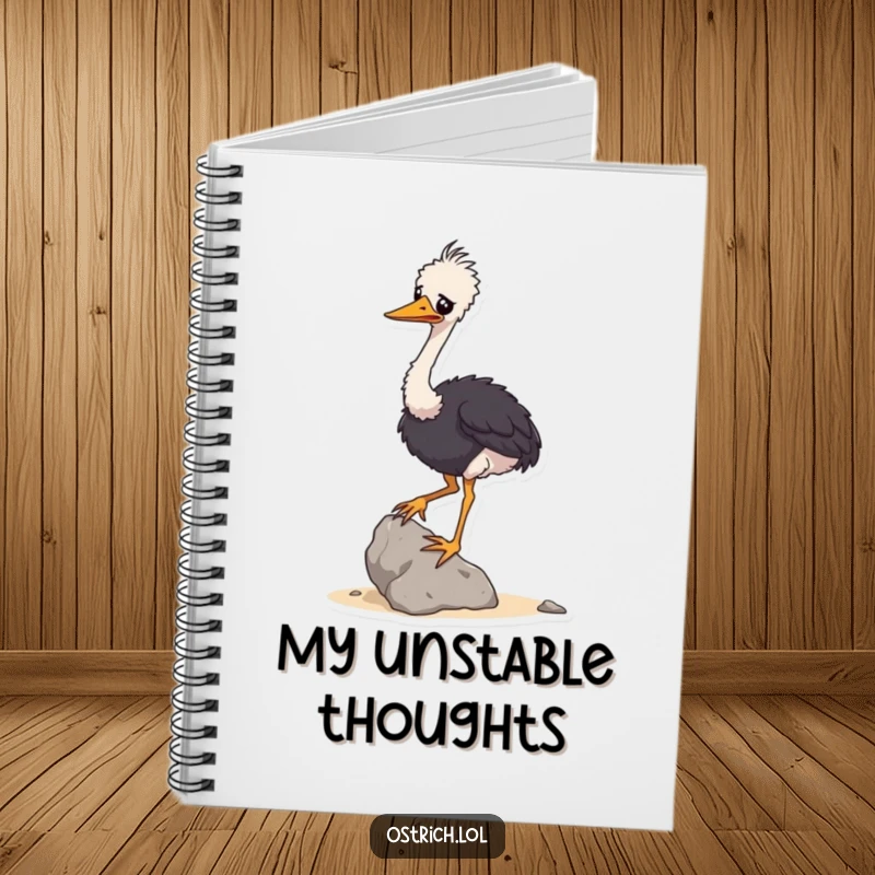 Funny notebook with a wobbly ostrich character balancing a small rock, perfect for jotting down humorous thoughts.